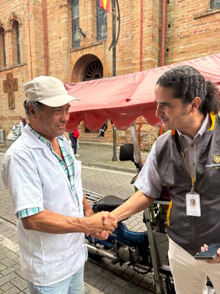 Gerente con vendedor ambulante